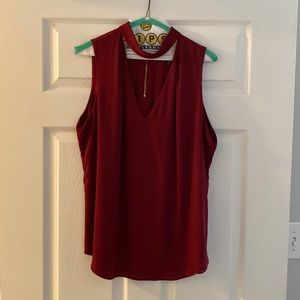 Keyhole blouse, WHBM, size 14 (cut small) more like 12.  Maroon color